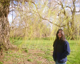 Jacqueline Cho standing by a tree 