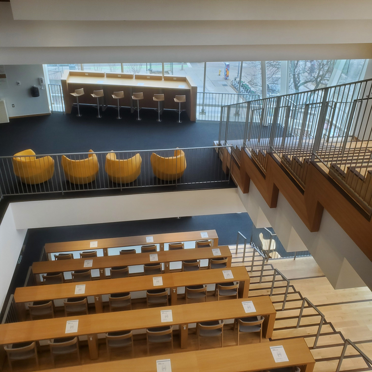 multilevel view of robarts common with stairs, tall seating and bucket seating